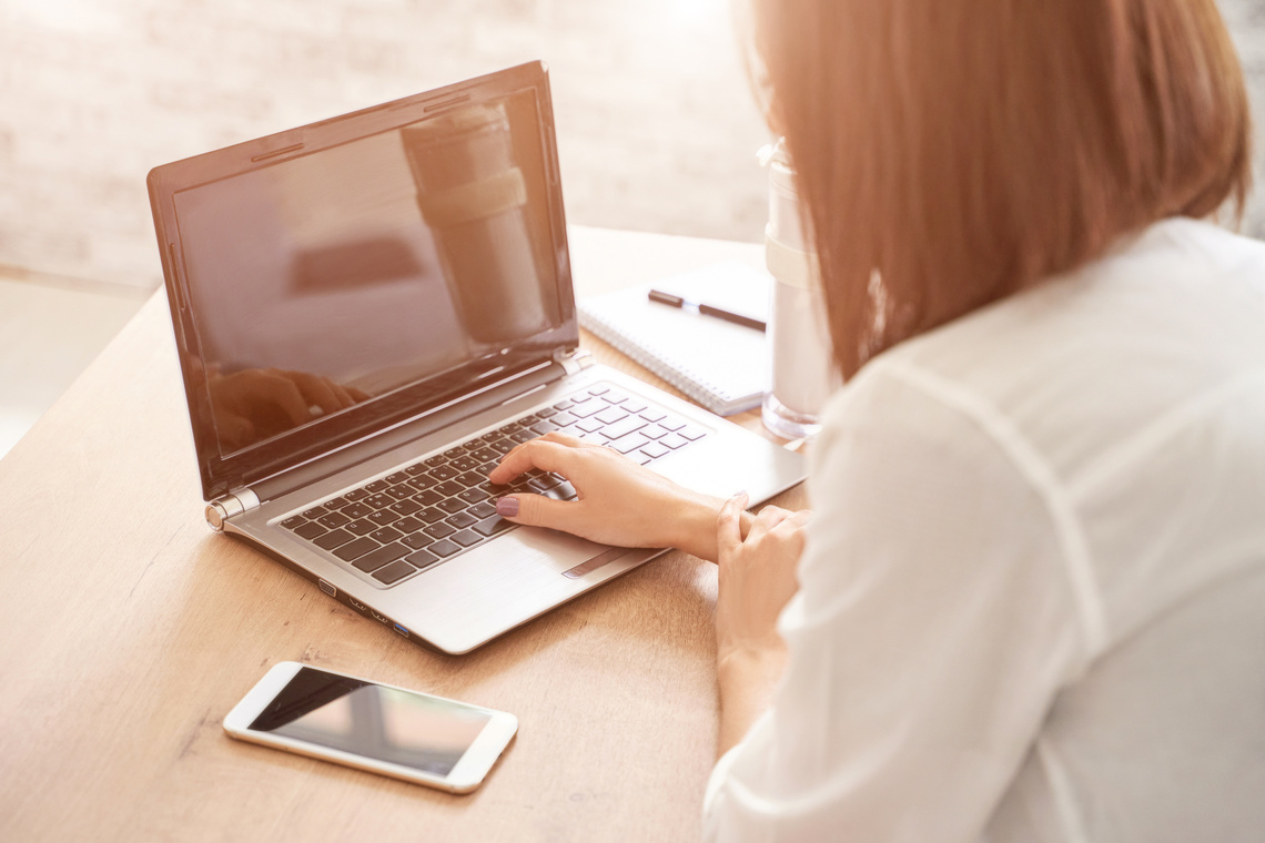 Female student work on laptop. Online lessons